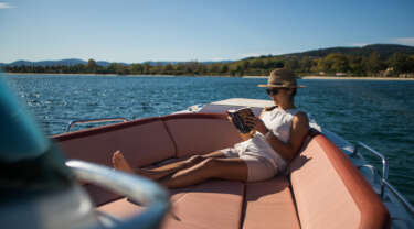 Pleasure boats cruising & lounging sundeck