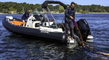 Pleasure boats water skiing